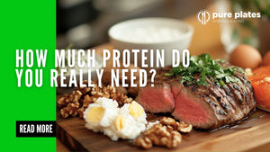 Juicy steak surrounded by boiled egg, salmon, nuts, and cottage cheese on a rustic wooden board, representing high-protein foods.